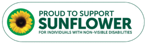 The Hidden Disabilities Sunflower logo: a yellow sunflower on a green background, indicating support for individuals with non-visible disabilities.