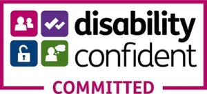 Disability Confident Committed (Level 1) accreditation badge, featuring the scheme’s signature pink border and colourful icons representing inclusive employment.